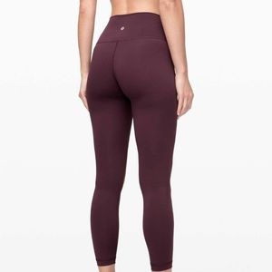 Size 4, LULULEMON 7/8 purple leggings.